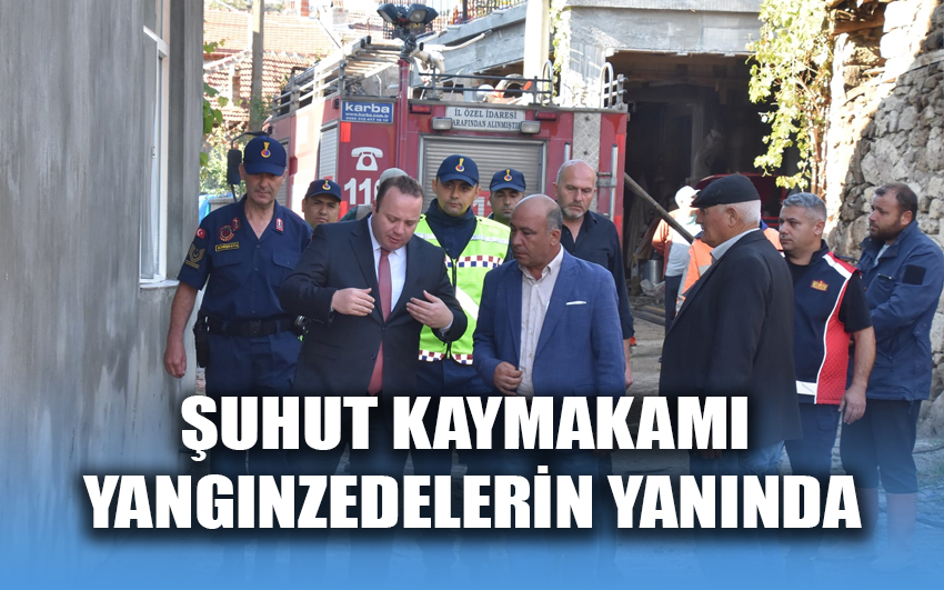 Şuhut Kaymakamı yangınzedelerin yanında